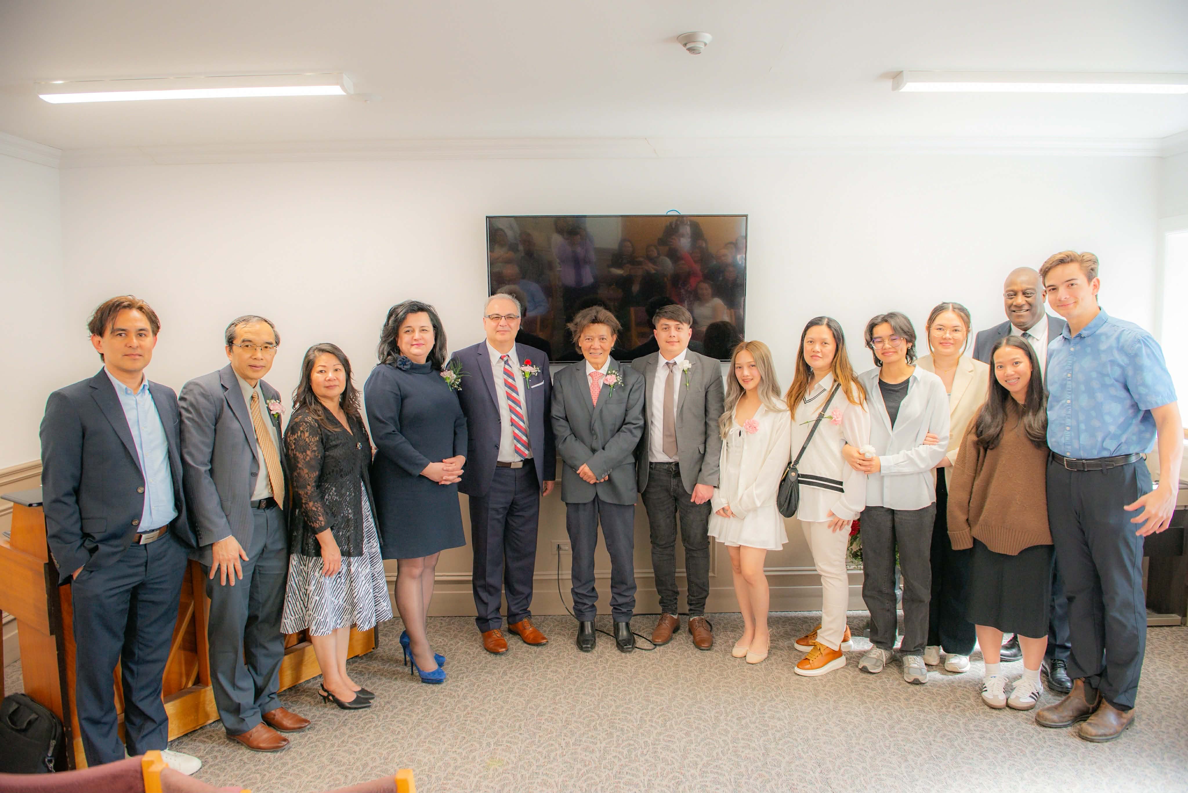 [Please describe the image here, e.g., 'The ministry team standing together after a service.']